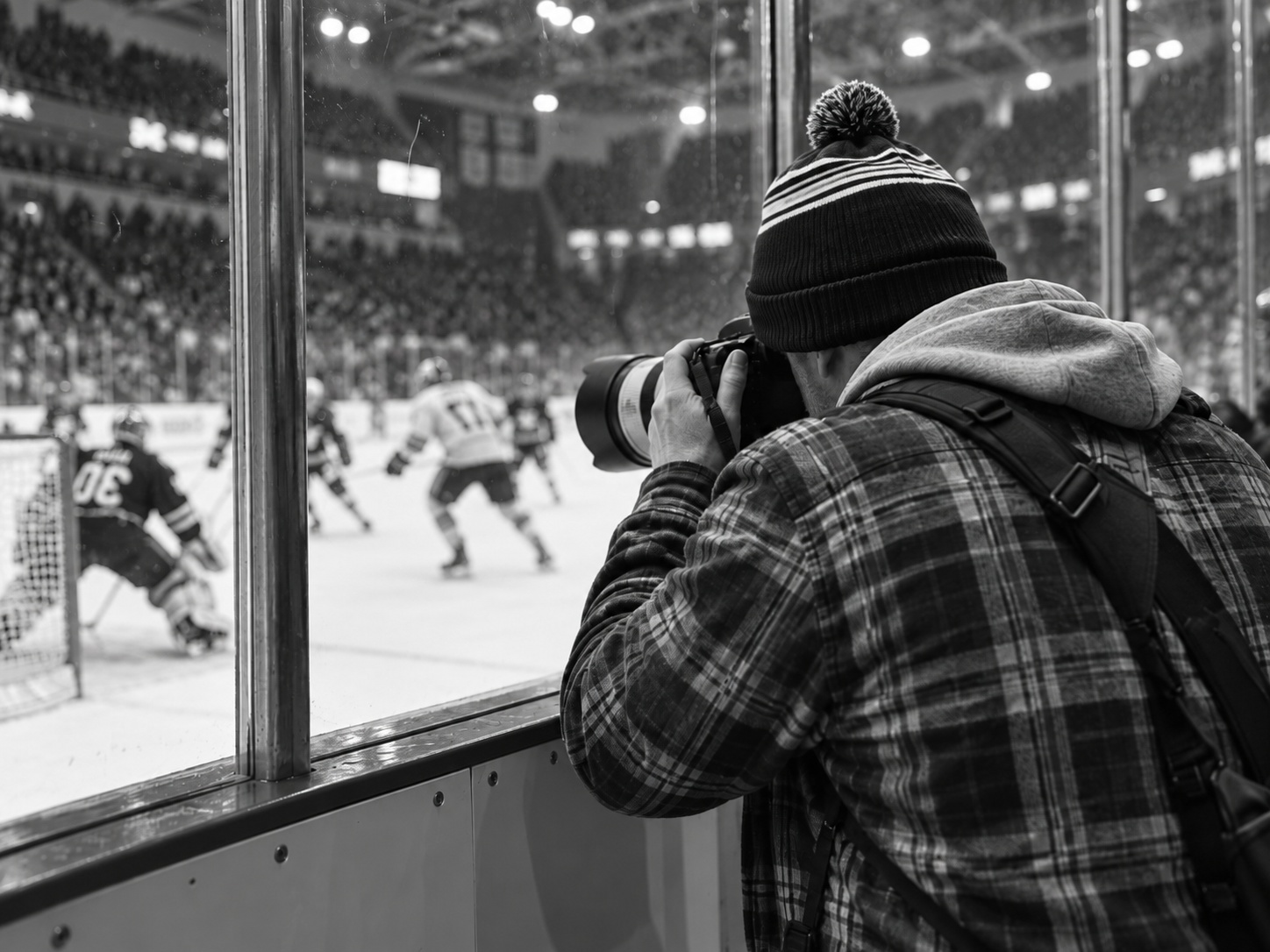 Chris photographing hockey rink-side
